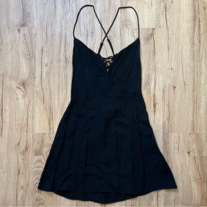 Reformation Black sleeveless micro dress size 10